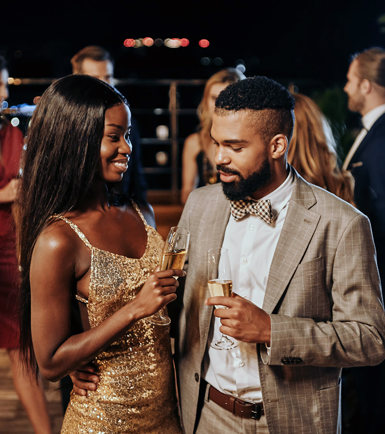 Couple drinking at a party